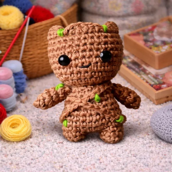 Baby Groot crochet amigurumi pattern with green leaf sprout details