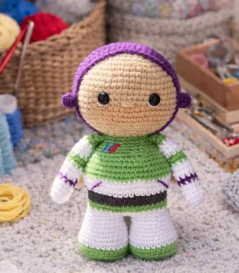 Buzz Lightyear crochet amigurumi doll with purple hood and green spacesuit